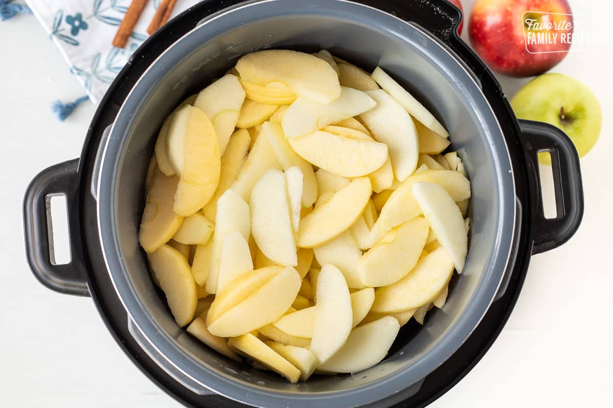 Instant Pot with sliced apples for applesauce.