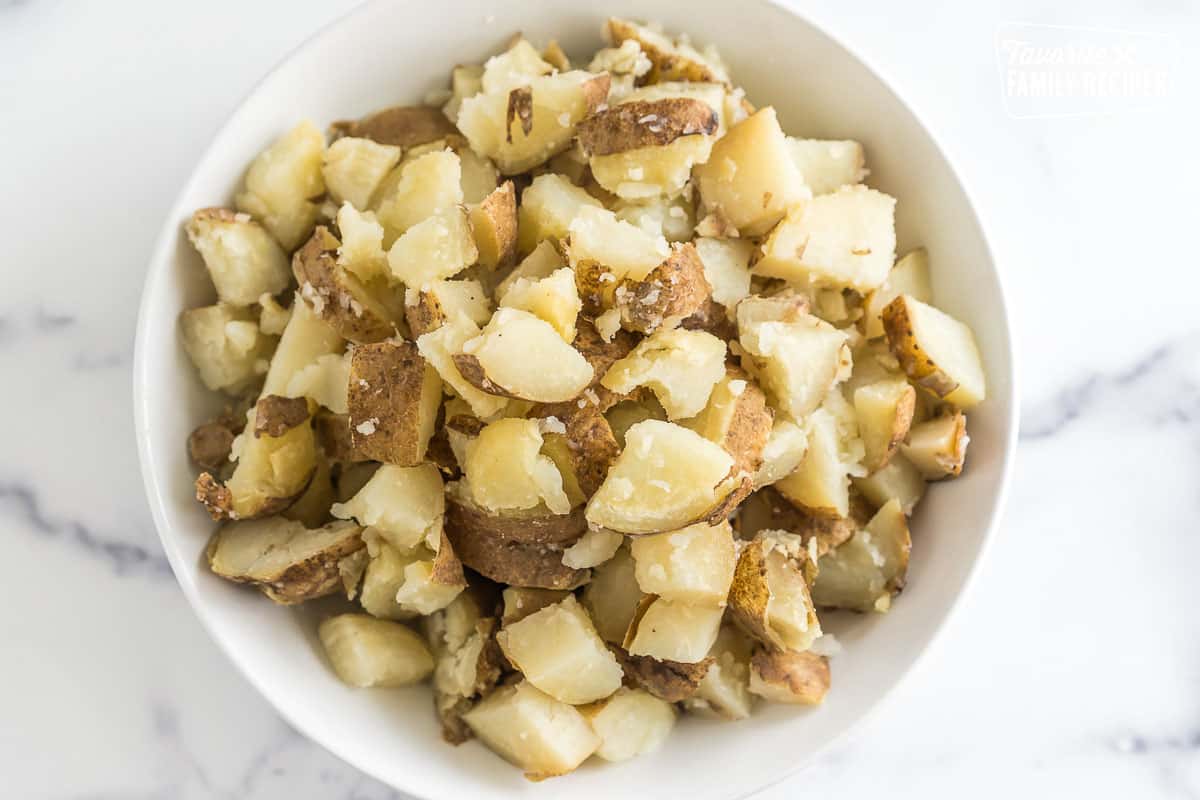 cubed baked potatoes in a bowl
