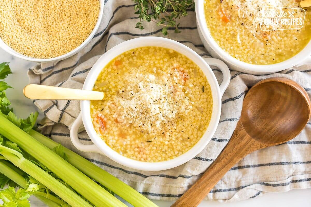 Pastina Soup in a bowl topped with cheese