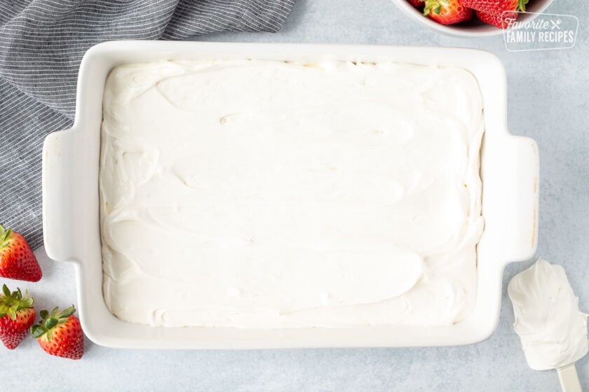 White cream cheese layer in a dish.