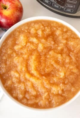 Large bowl of Instant Pot Applesauce sprinkled with cinnamon.