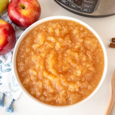 Large bowl of Instant Pot Applesauce sprinkled with cinnamon.