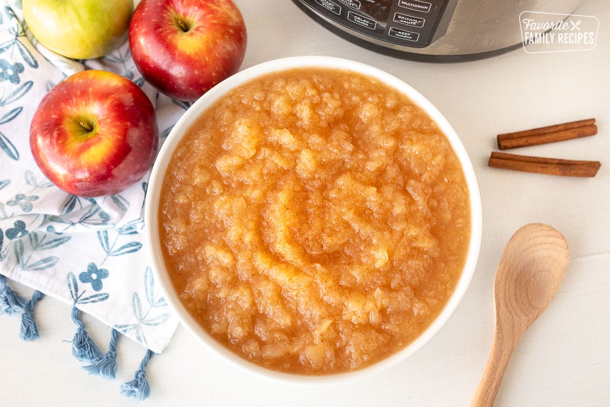 Large bowl of Instant Pot Applesauce sprinkled with cinnamon.