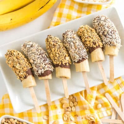 chocolate covered bananas on a plate