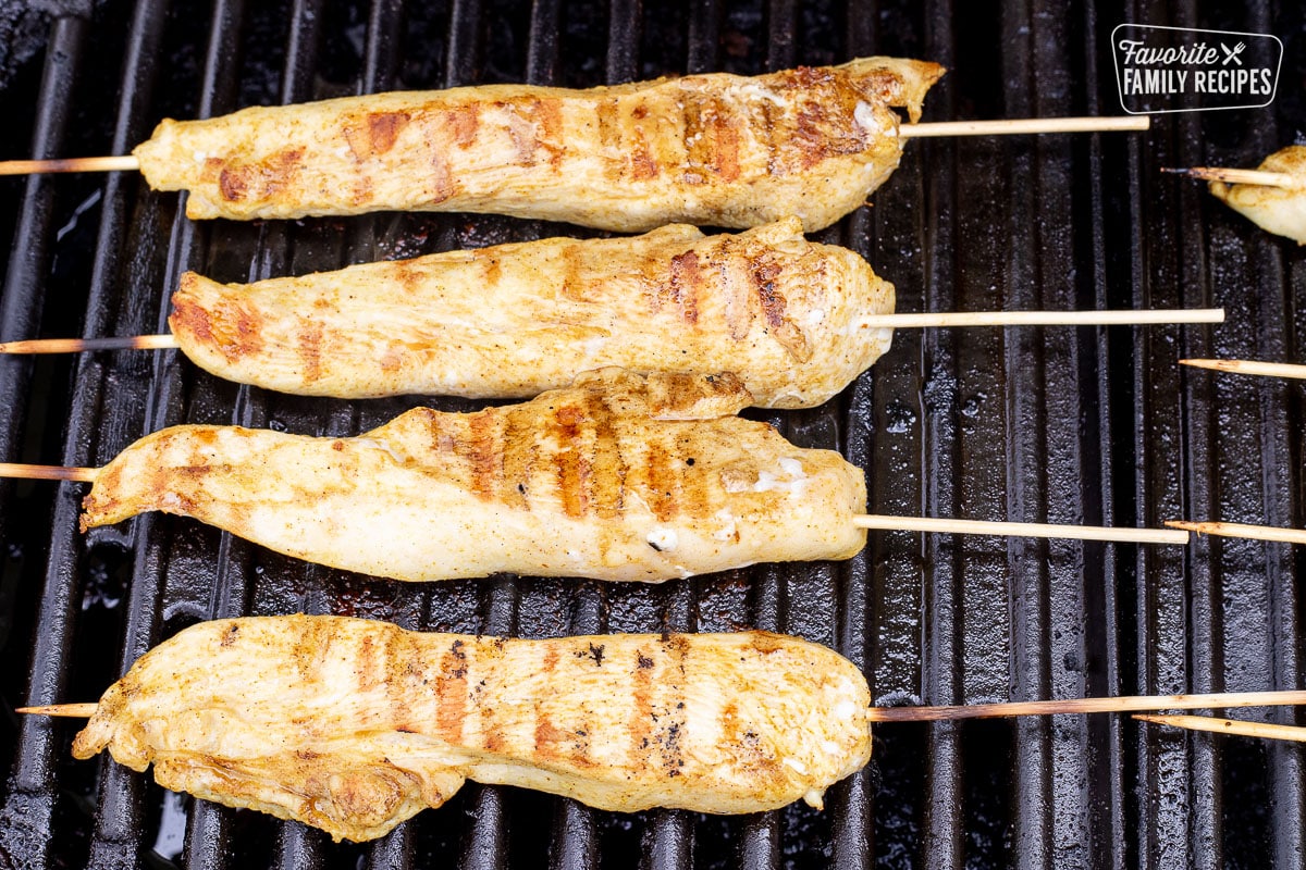 Grilling Chicken skewers on a barbecue grill.