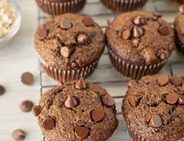Healthy Chocolate Chip Muffins cooling on a wire rack.
