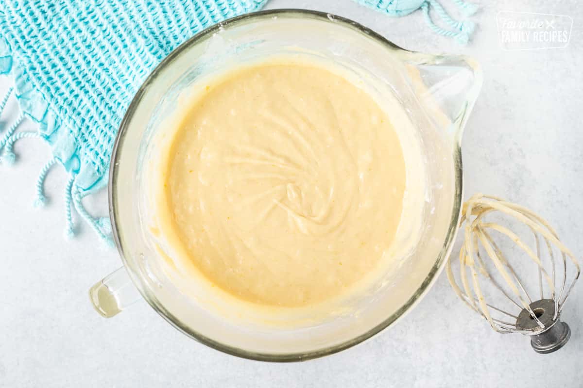 Glass mixing bowl with batter. Whisk attachment on the side.