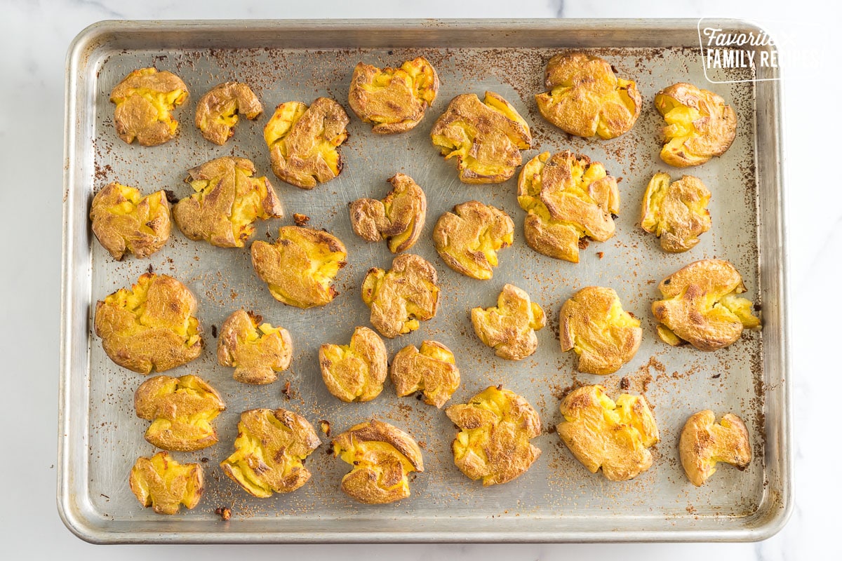 Cooked Smashed Potatoes on a baking sheet