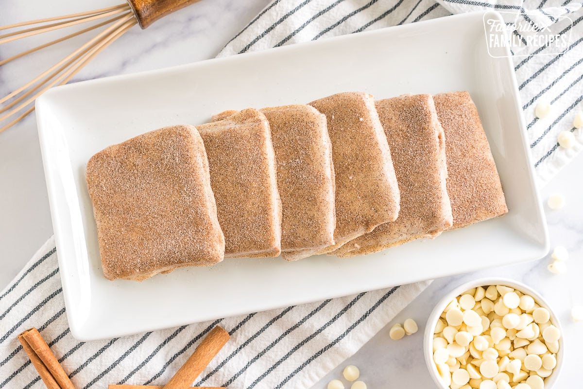 Churro toffee stacked on a plate