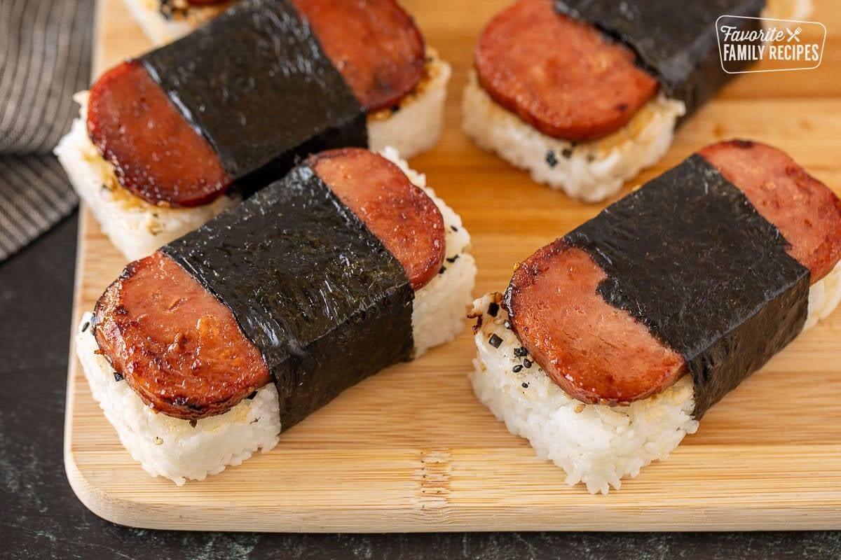 Spam Musubi constructed on a cutting board.