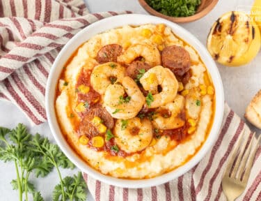 Bowl of Shrimp and Grits with sauce.