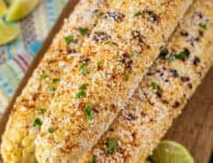 Three ears of Mexican Street Corn.