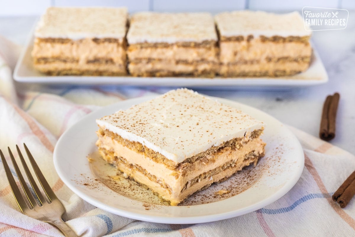 Slice of Pumpkin Eclair Cake on a plate.