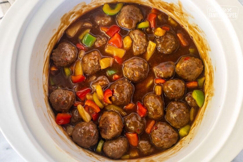 Crock pot of sweet and sour meatballs.