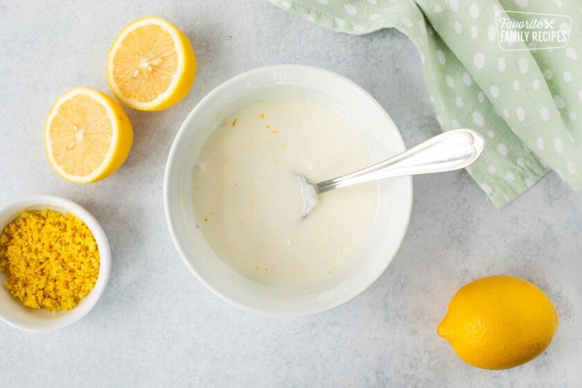 Glass bowl of lemon icing.
