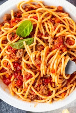 Plate of Nick's Authentic Italian Spaghetti with a twirled fork.