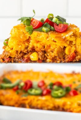 Spatula with Mexican cornbread casserole slice topped with fresh cilantro, diced tomatoes and jalapeños.