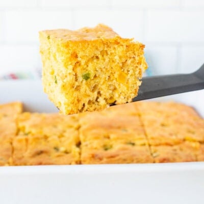 Slice of Mexican cornbread on a spatula.
