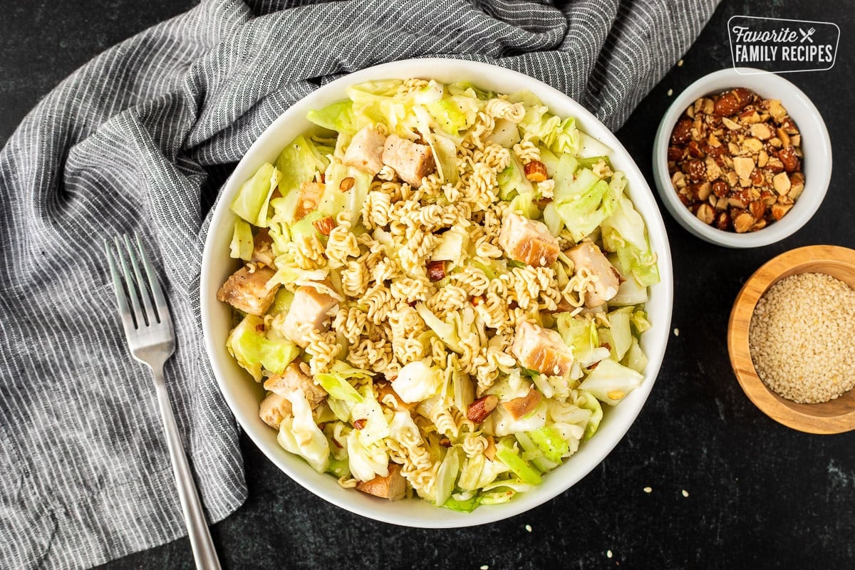 Bowl of Ramen Noodle Salad (Pai Mai topped with almonds, sesame seeds and season toasted ramen noodles.