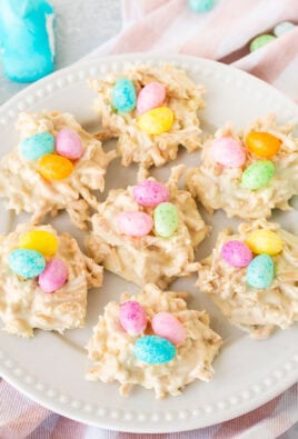 White Chocolate Bird Nests arranged on a plate with jelly beans.