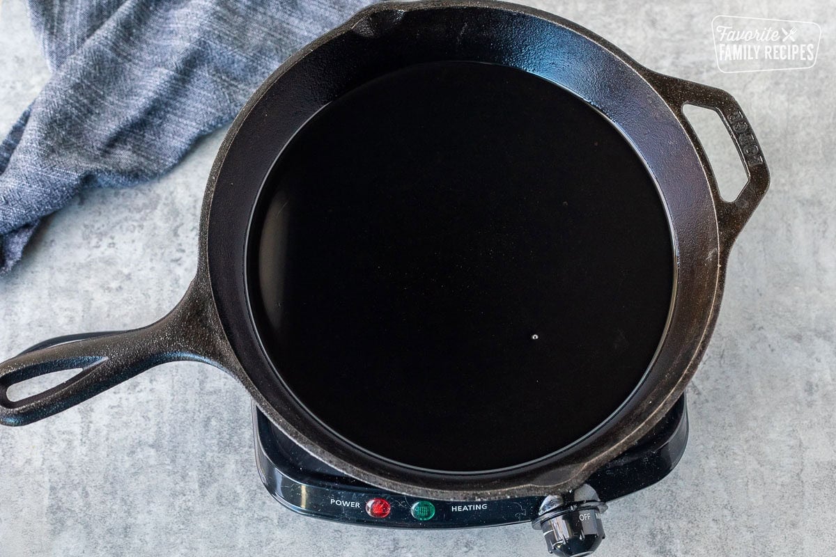 Cast-iron skillet with hot oil.