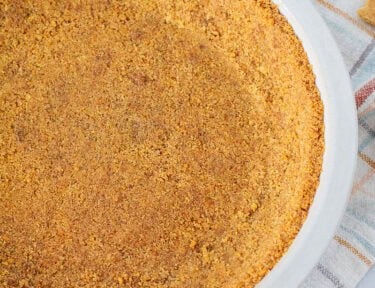 Graham Cracker Pie Crust pressed into a pie plate.