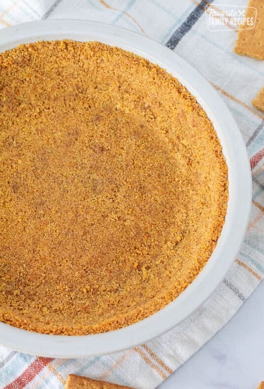 Graham Cracker Pie Crust pressed into a pie plate.
