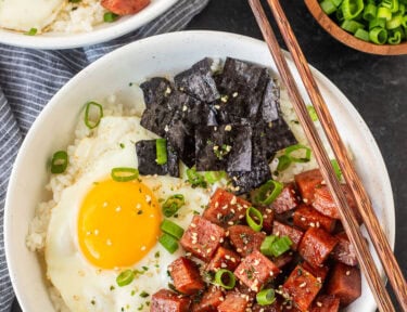 Spam Musubi Bowls with spam, egg, green onion, nori and rice.