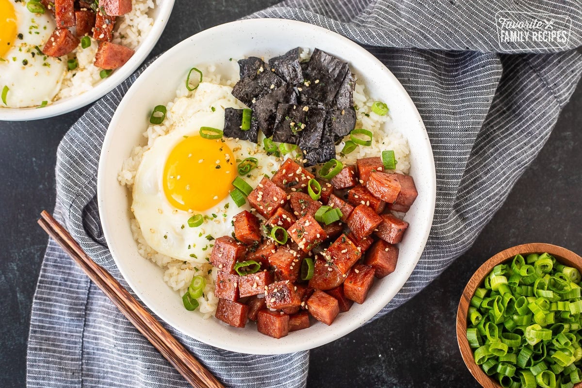 Spam Musubi Bowl with spam, egg, green onion, nori and rice.