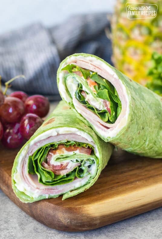 Ham and Cheese Wrap with a cream cheese pineapple spread, ham, lettuce and tomato.
