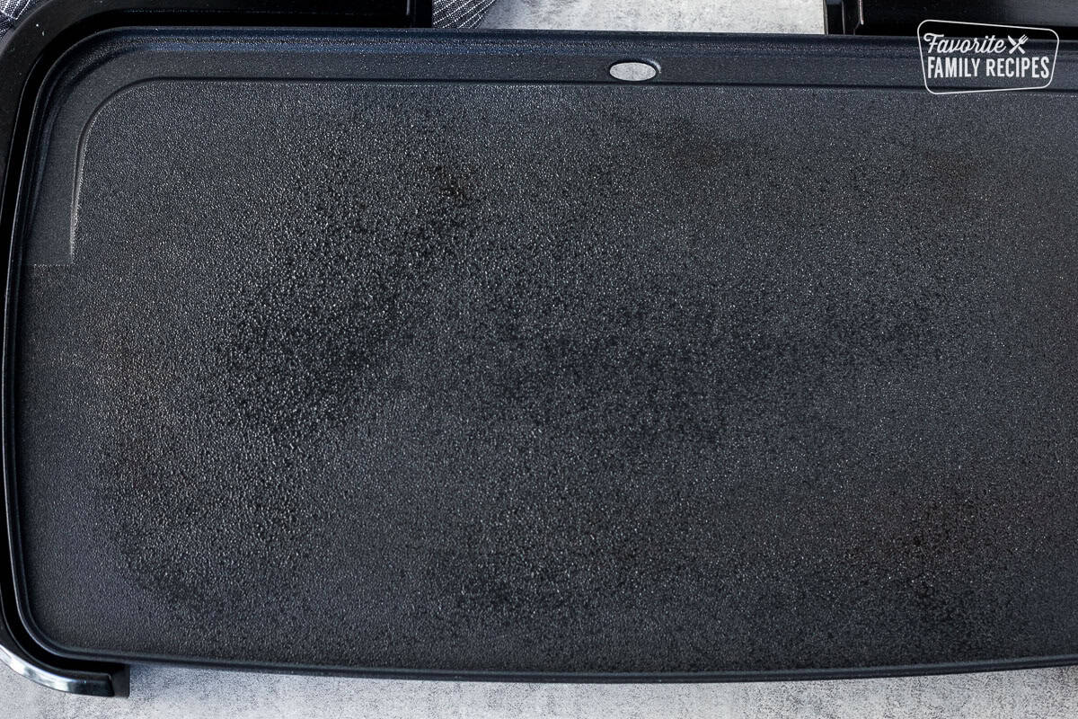 Griddle with cooking spray.