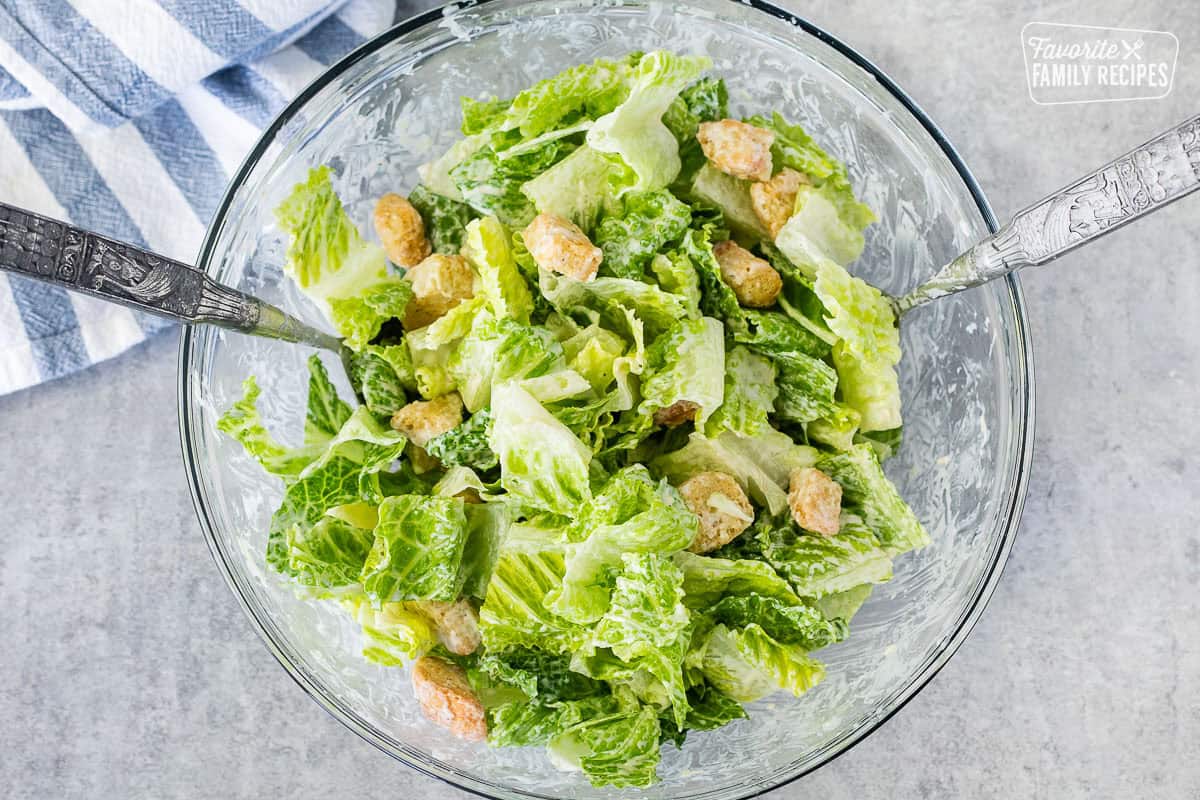 Tossed salad of romaine lettuce, caesar dressing and croutons.