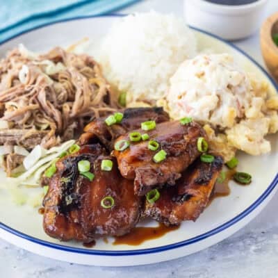 Hawaiian Plate Lunch with teriyaki chicken, kalua pork, white rice and Mac salad.