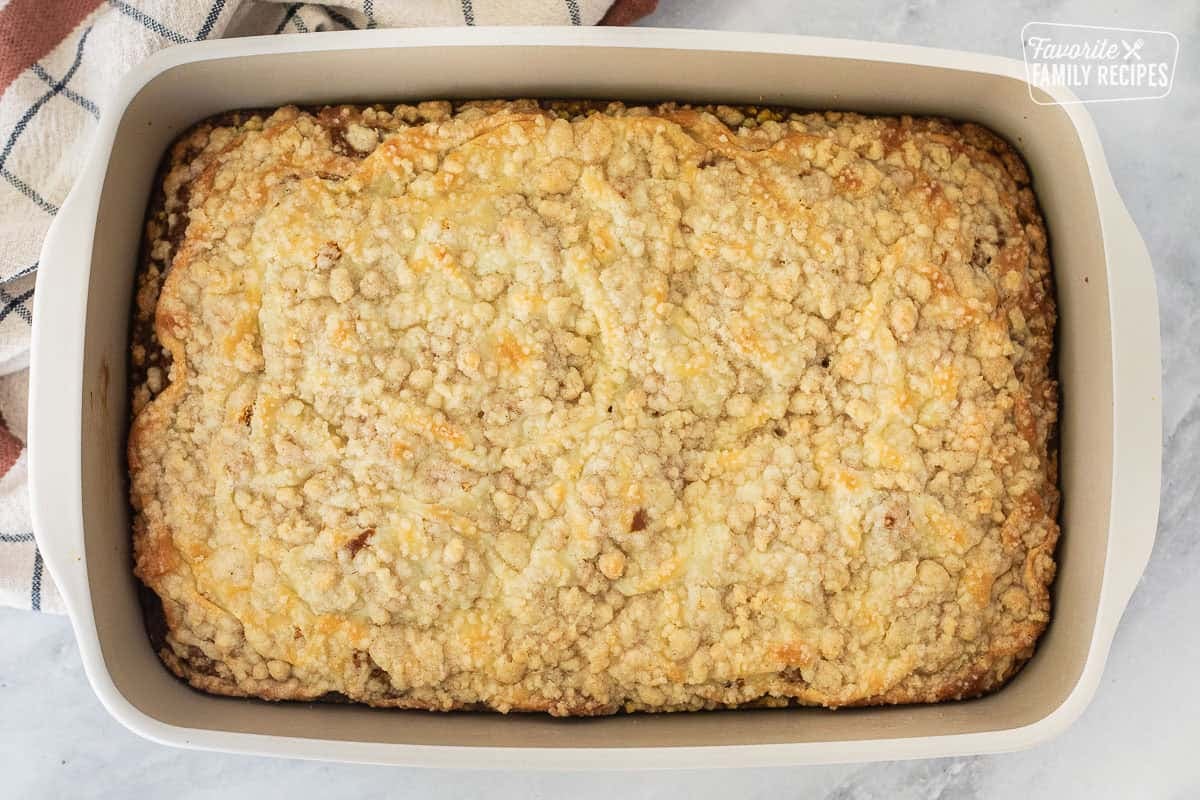 Baked pumpkin coffee cake in a baking dish.