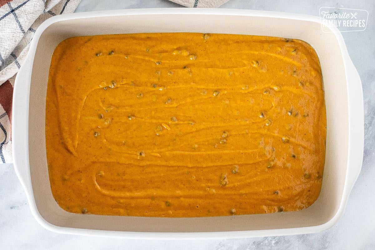 Baking dish with pumpkin coffee cake batter.