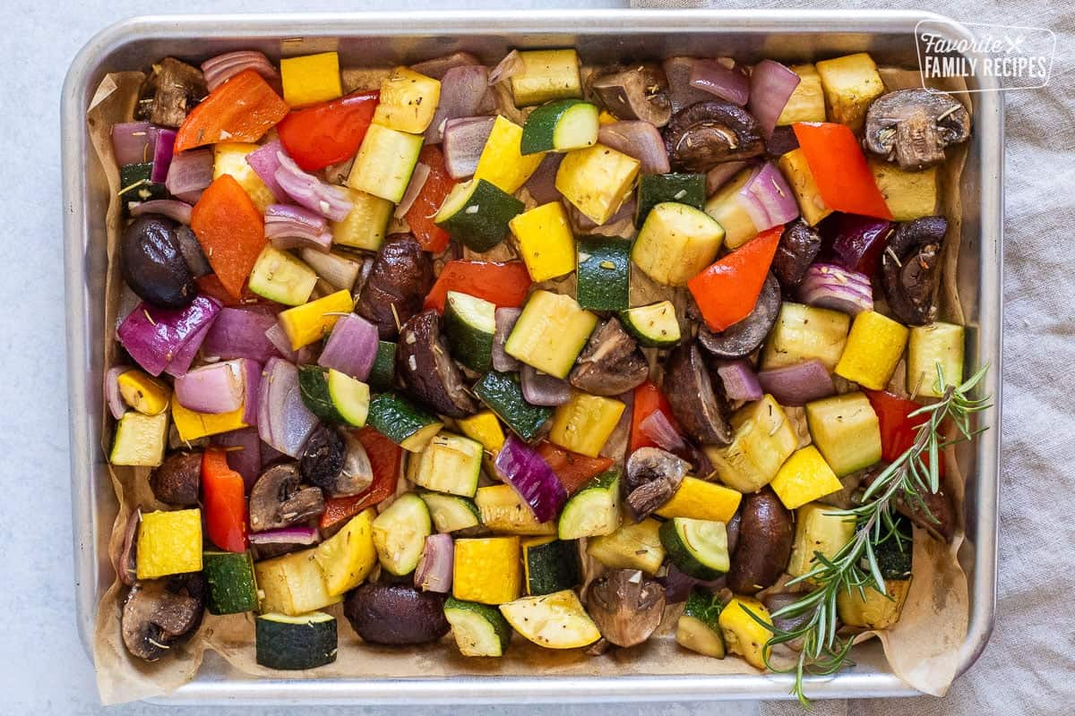 Roasted vegetables on a sheet pan.