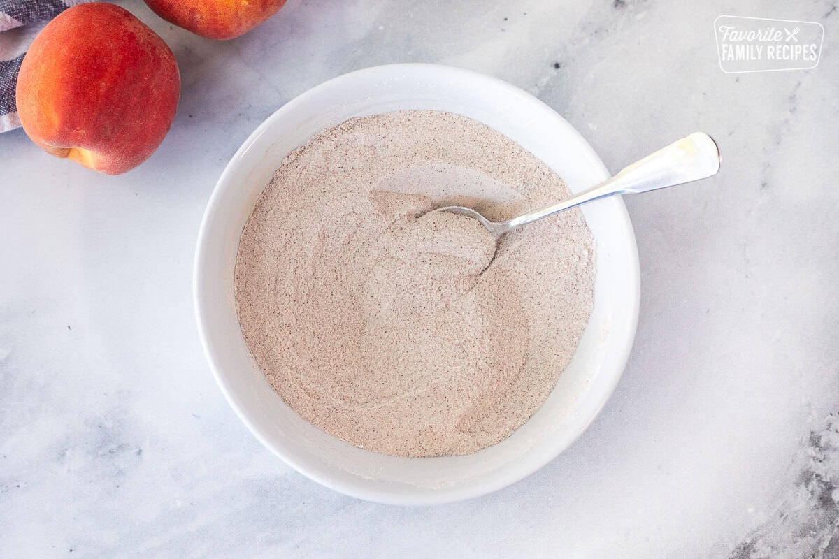 Small mixing bowl with cinnamon and sugar.