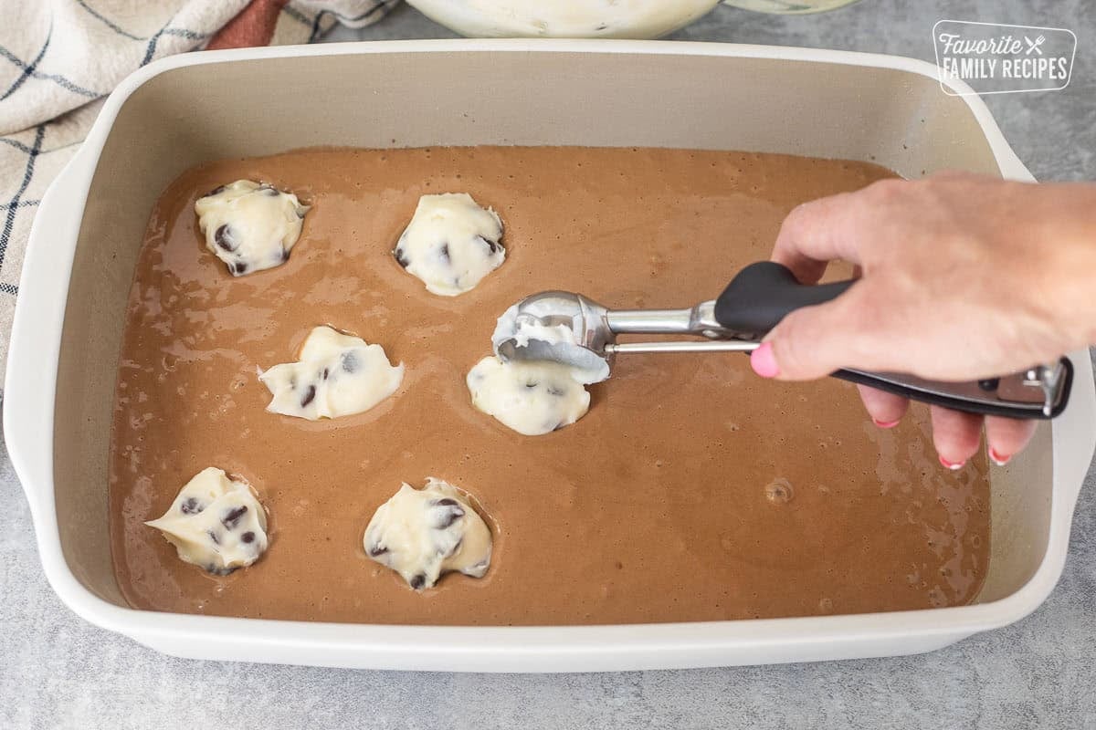 Cream cheese chocolate chip scoop into German chocolate cake batter.