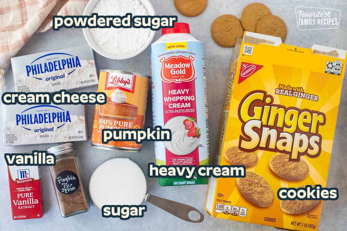 Ingredients to make Pumpkin Trifle including ginger snaps, heavy whipping cream, pumpkin puree, sugar, pumpkin pie spice, vanilla, cream cheese and powdered sugar.