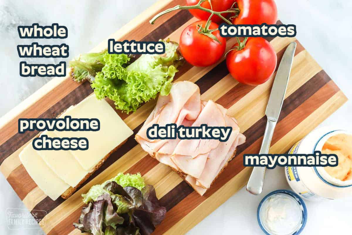 Ingredients to make a Turkey Sandwich: bread, deli turkey, provolone cheese, lettuce, tomato, mayonnaise.
