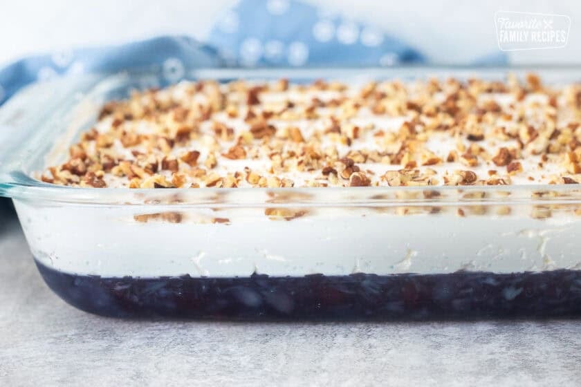 Blueberry Jello salad topped with pecans.