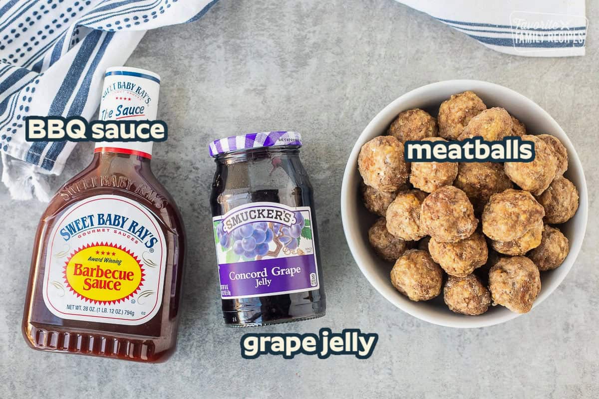 Ingredients to make grape jelly meatballs including Sweet Baby Ray's barbecue sauce, Concorde grape jelly, and frozen meatballs.