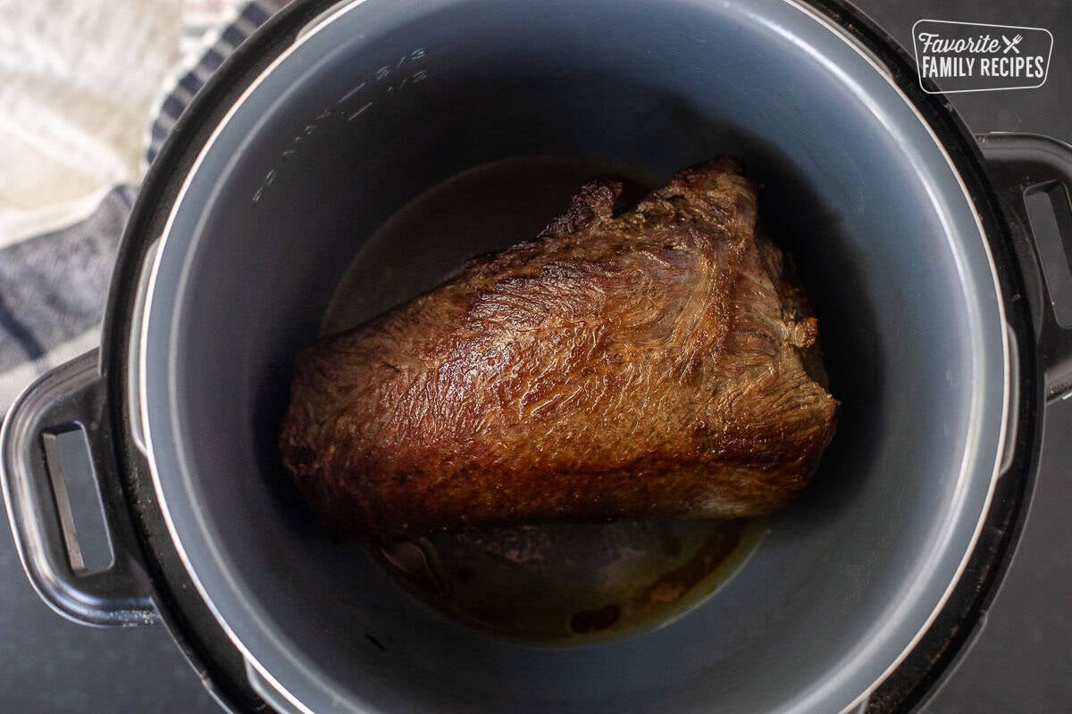 Searing beef chuck roast in instant pot.