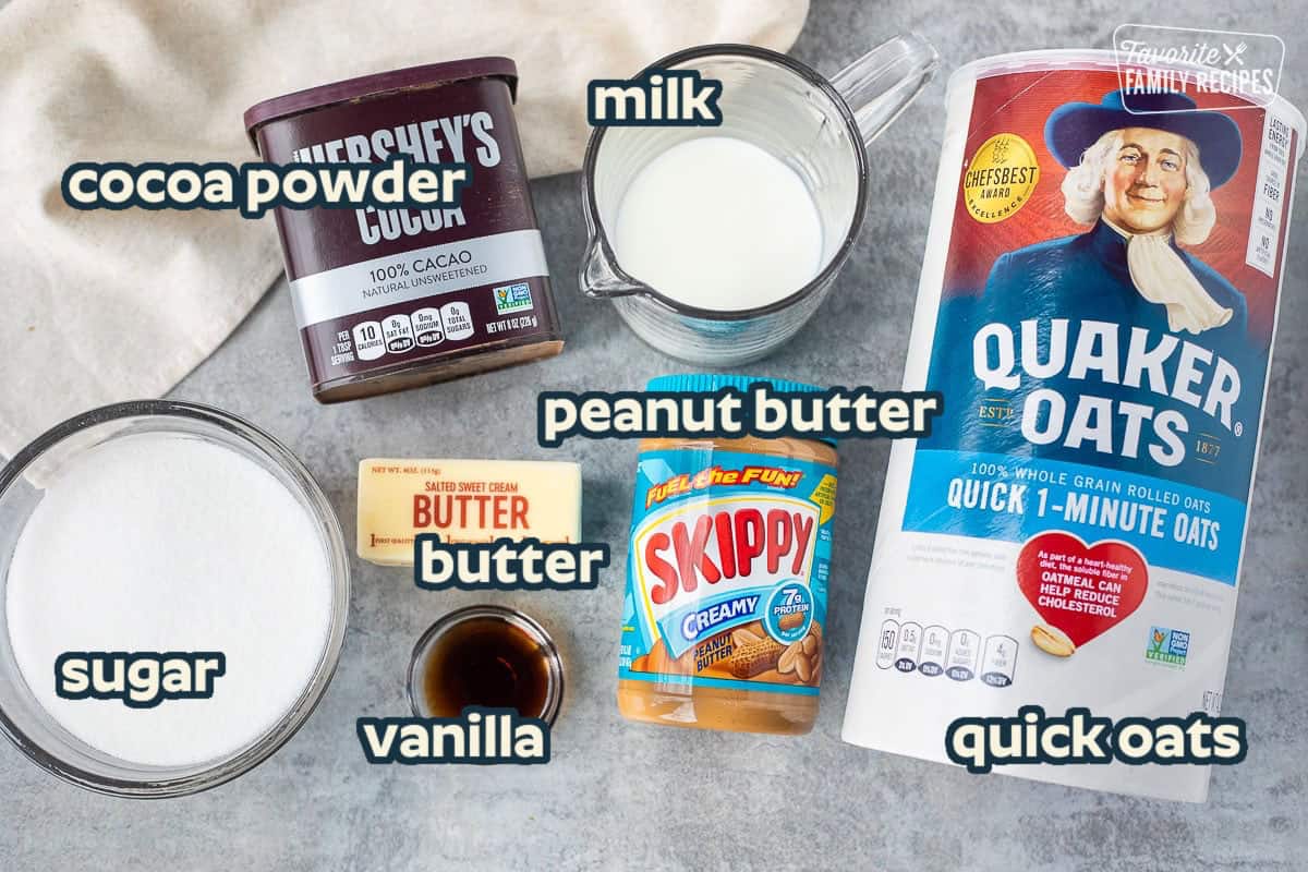 Ingredients to make no bake cookies including oatmeal, milk, peanut butter, butter, cocoa, vanilla and sugar.