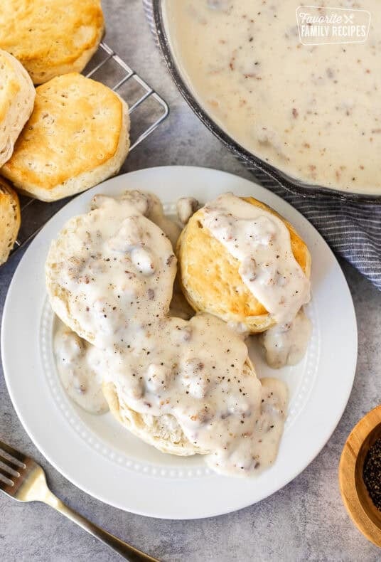 A plate of biscuits topped with sausage gravy, an easy breakfast recipe