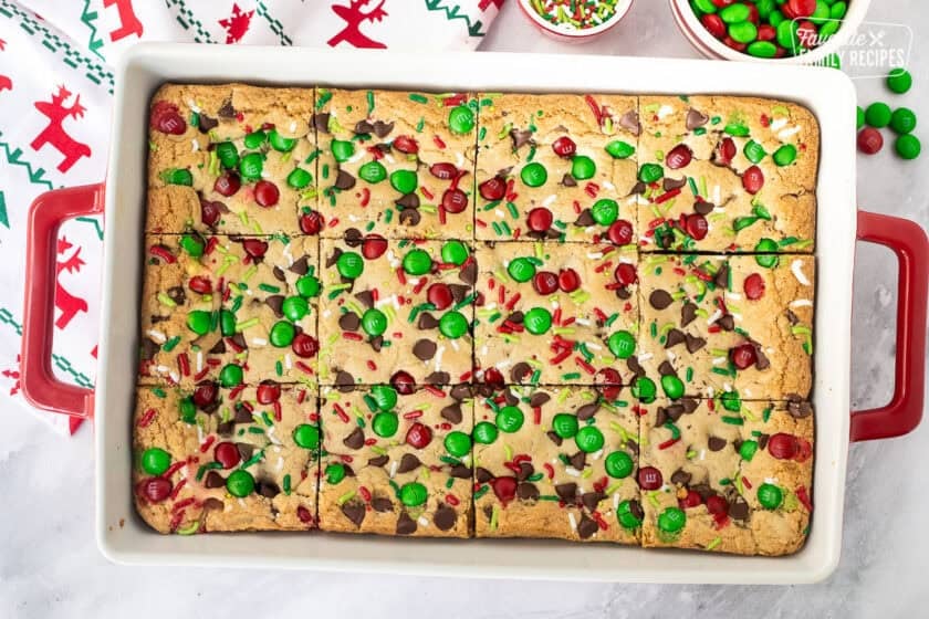 Cut Christmas Cookie Bars in a baking dish.