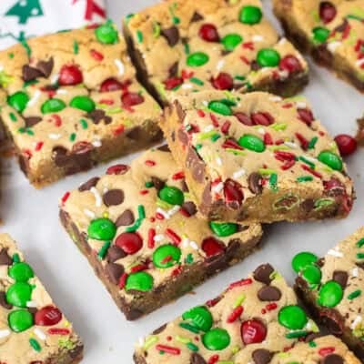 Christmas Cookie Bars cut and resting on top of each other.