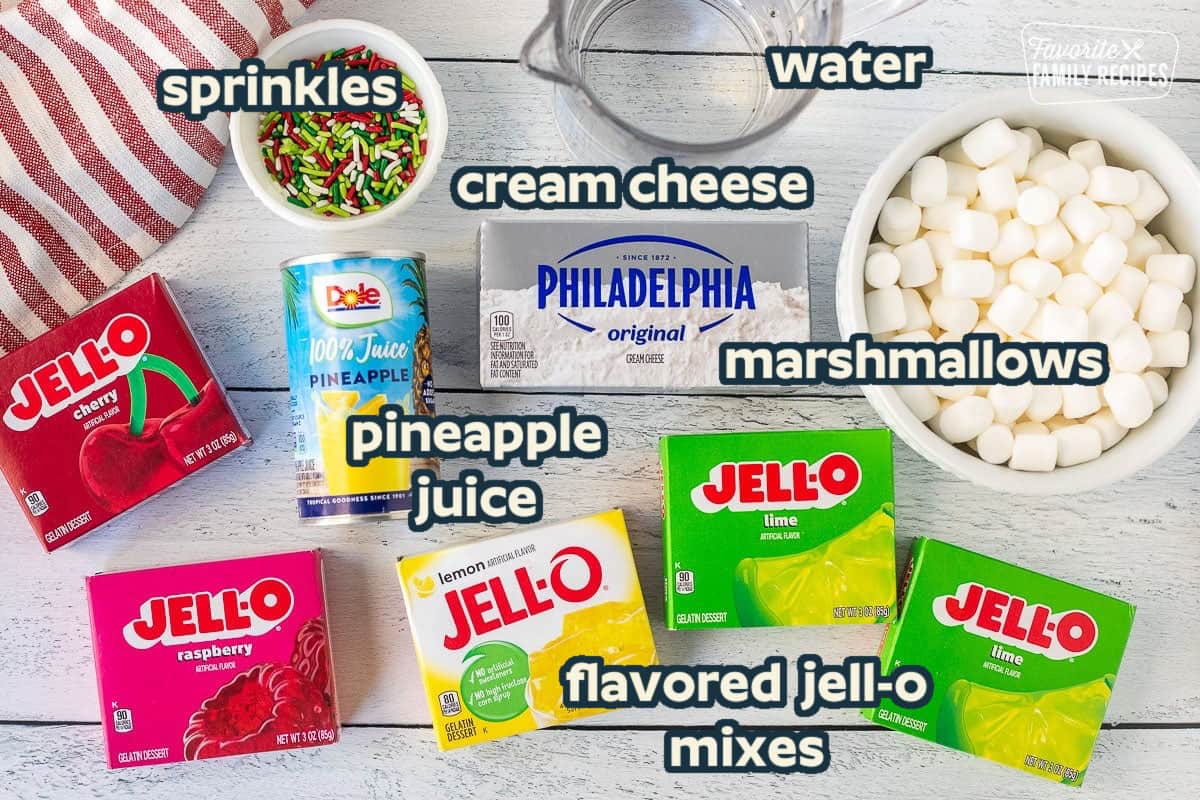 Ingredients needed for Christmas Jello: Flavored gelatin mixes, cream cheese, marshmallows, pineapple juice, Christmas sprinkles