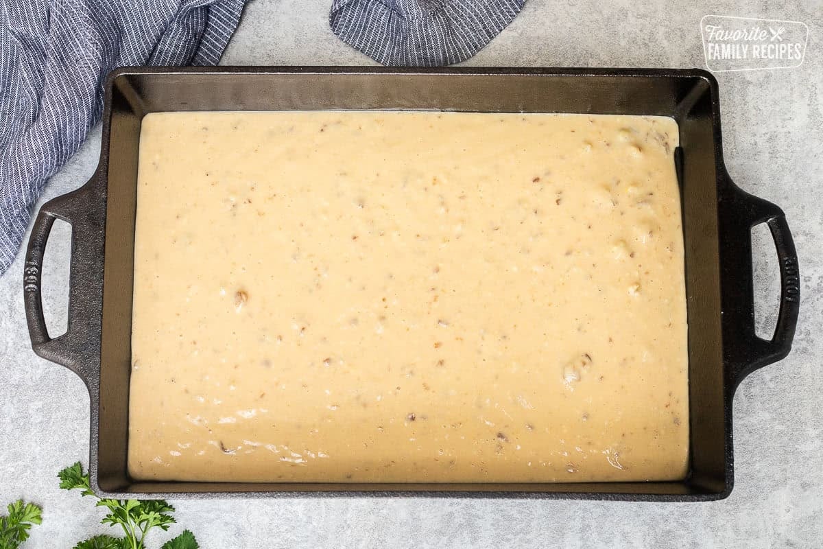 Baking dish with soup mixture in the bottom.