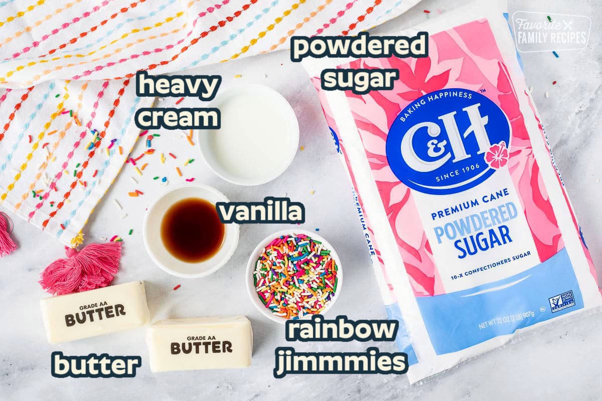 Ingredients to make Funfetti Frosting including butter, sprinkles, vanilla, heavy cream and powdered sugar.